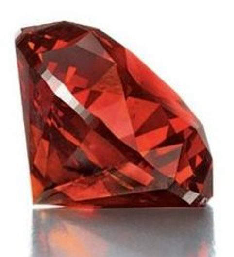 Side view of 3.15-carat, round brilliant-cut, fancy reddish-orange diamo