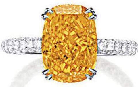 4.19-carat, cushion-cut, fancy vivid orange diamond set on a 18k white-gold ring 