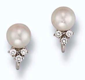 The Pair of Cultured Pearl and Diamond Earclips by Birks, Canada, which was Lot No, 15 at the auctions, was an often worn, well treasured pair of earrings, which H.R.H. Princess Margaret acquired before the 1960s, during her first official visit to Canada
