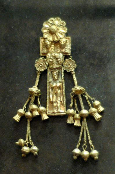 Ancient Greek jewelry- Pendant with naked woman made of electrum, Rhodes- 620 B.C. 
