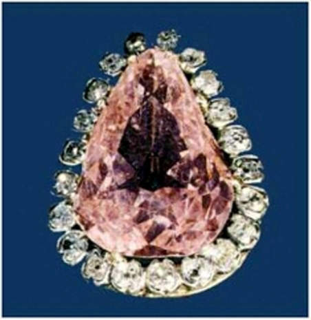 Pear-shaped Conde Pink diamond in a setting surrounded by a row of smaller diamonds
