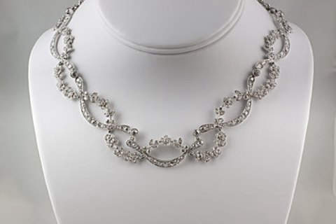 G10605 - Open work floral link design diamond and platinum necklace 