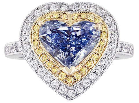 Heart-shaped, white-gold, cluster ring set with the Lady Diantha Blue Diamond as centerpiece 
