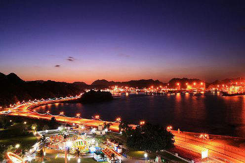 Muttrah Corniche in Muscat Oman at night.