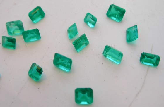 Well-saturated, vivid green Muzo emeralds with a slightly yellowish undertone 