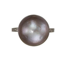 An attractive natural black pearl ring