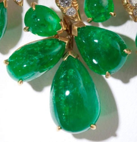One of the large emerald fringes enlarged showing clearly the inclusions known as "jardin" 