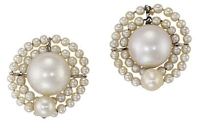 Pair of natural pearl earrings with a circular design