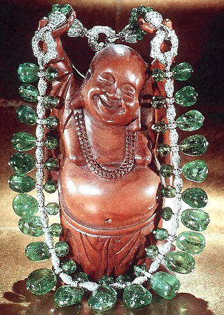 tumbled-emerald-necklace-on-laughing-wooden-buddha