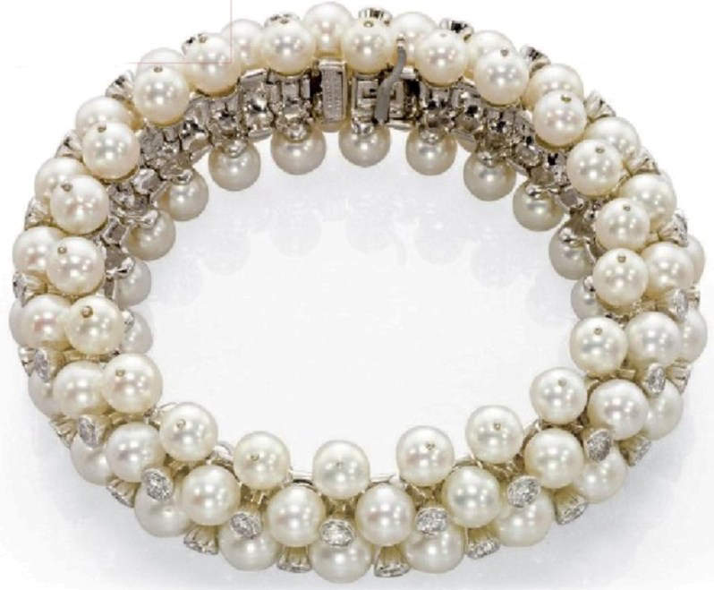 An attractive cultured pearl and diamond bracelet by Van Cleef & Arpels