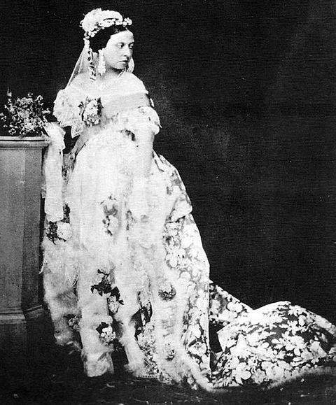 Queen Victoria photographed in her wedding gown around 1854