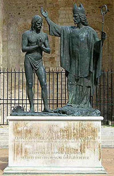 Statute in the Cathedral of Reims showing baptism of Clovis by Saint Remi in 496 A.D.