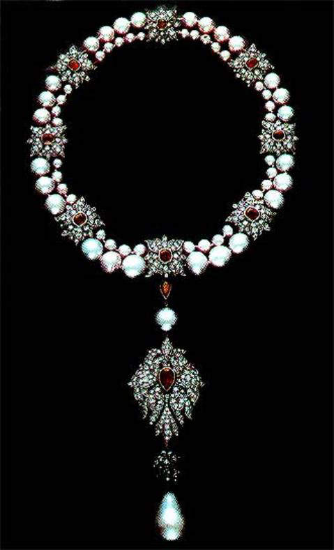 La Peregrina pearl mounted as pendant on a pearl, ruby and diamond necklace designed by Cartier in 1969 