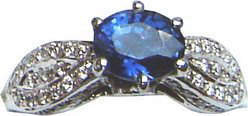 Ring of unique design with large Ceylon natural blue sapphire and