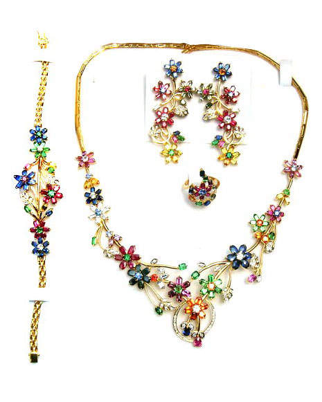 Complete multicolored jewelry set with four items,made up of high quality Ceylon(Sri Lanka) blue sapphires,yellow sapphires,white sapphires,orange sapphires,Ceylon rubies,Brazilian emeralds and diamonds set in 18k gold.